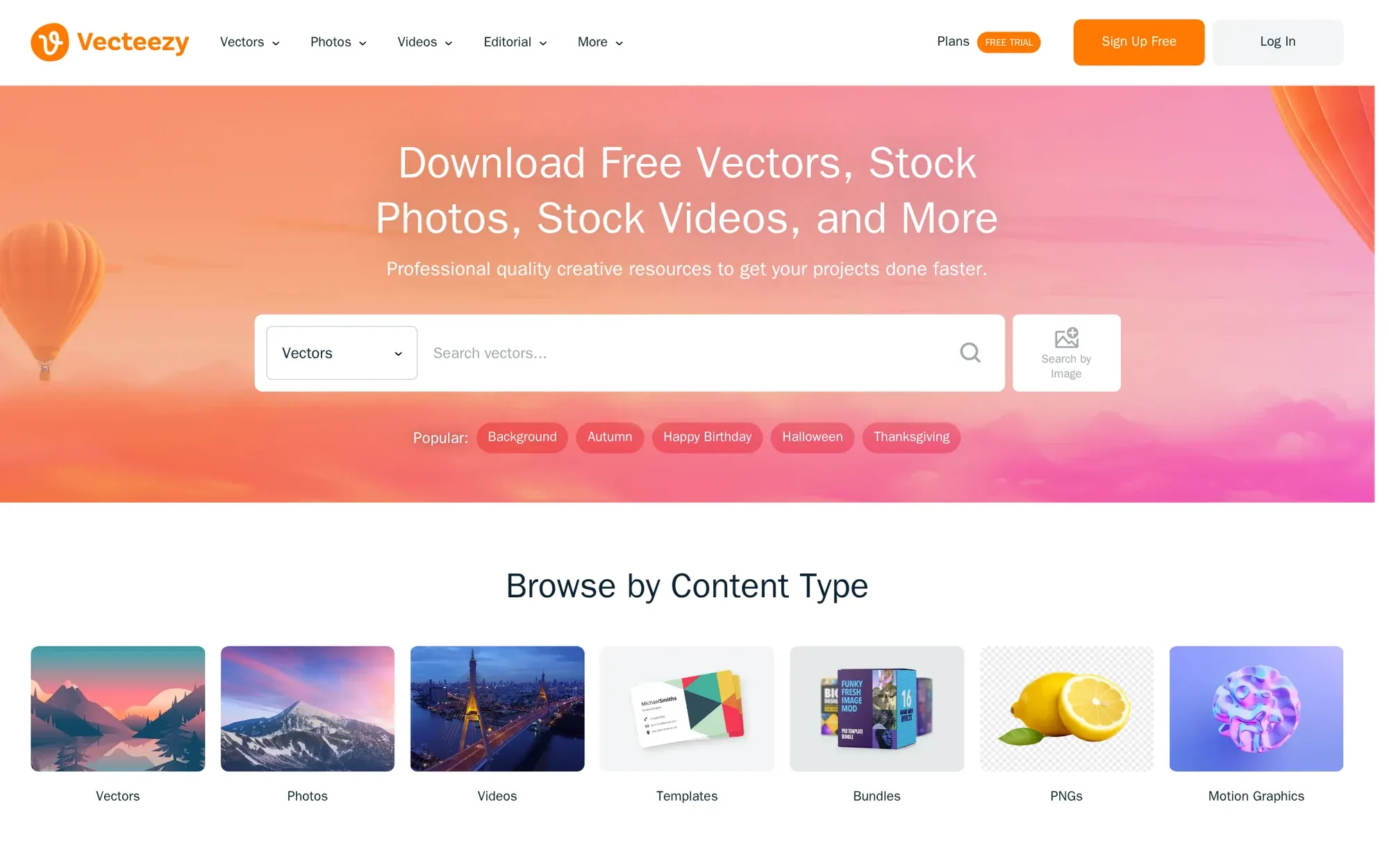 Vecteezy in October 2026: the Vecteezy homepage search over an orange sunset banner